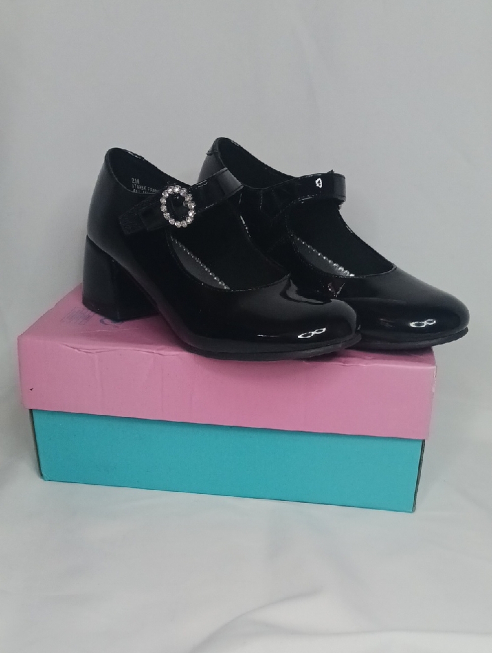 Rachel Shoes Black Patent Mary Jane Heel with Rhinestone Oval Buckle.